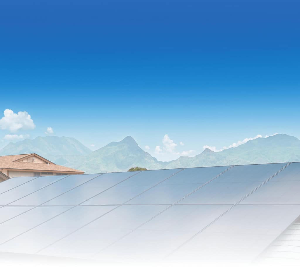 Solar panels with Oahu mountains